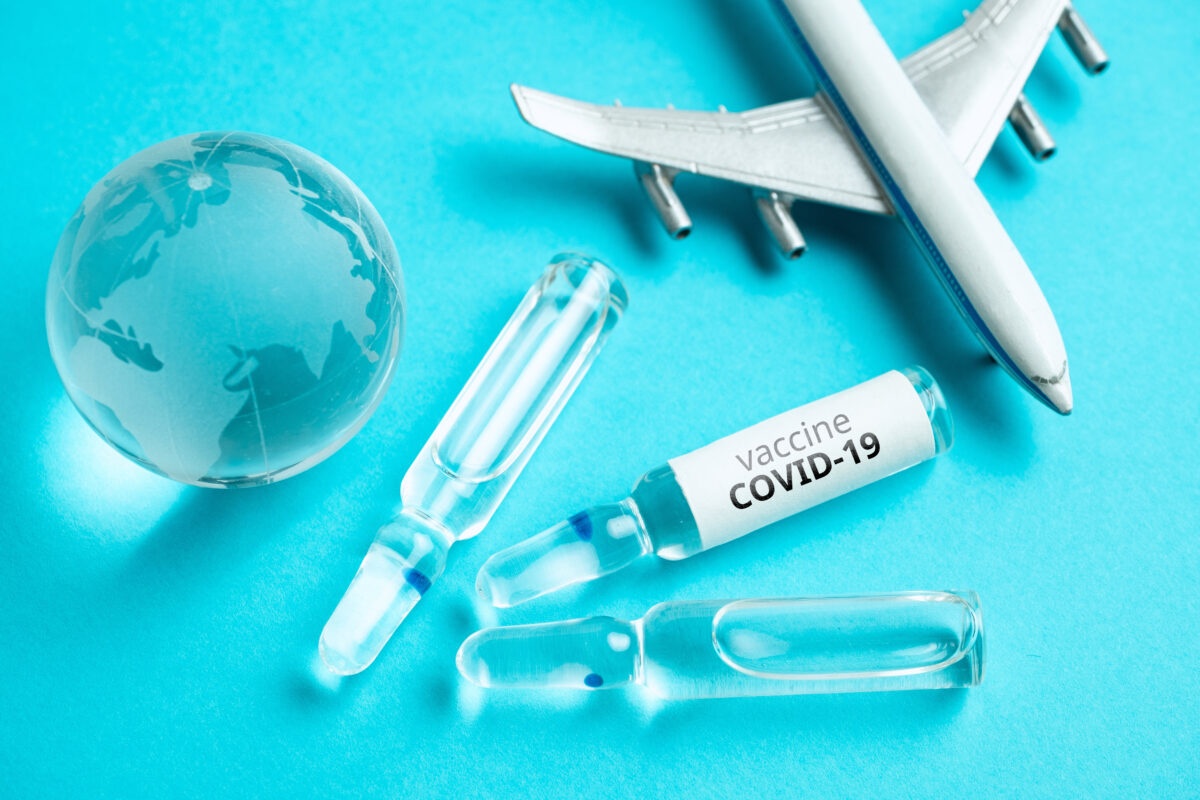 concept-worldwide-delivery-covid-19-coronavirus-vaccine-by-plane-flat-lay-1-1200x800.jpg
